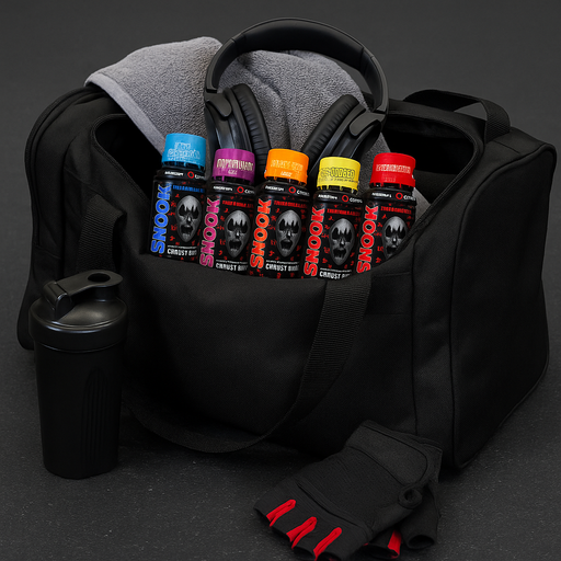Black gym bag on a gym floor with a grey towel, black headphones, shaker bottle, and red-accented gloves, featuring all flavours of Murdered Out Shook Energy Shot bottles ā lifestyle scene with subtle MySupplementShop-inspired colour touches.