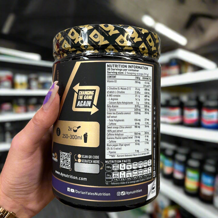 Close-up of (Dorian Yates DY Nutrition Blood And Guts 380g) held up inside My Supplement Shop, clearly showing Nutritional Values on the packaging in a Sports Nutrition setting.