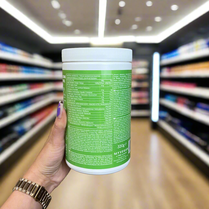 Close-up of (MyProtein MyVegan Clear Vegan Protein 320g) held up inside My Supplement Shop, clearly showing Nutritional Values on the packaging in a Sports Nutrition setting.